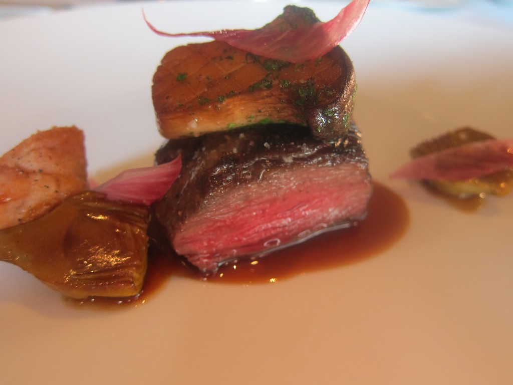 Snake River Farms "Calotte de Boeuf Grillee" with "Ris de Veau," King Trumpet Mushroom, Baby Artichoke and Belgian Endive