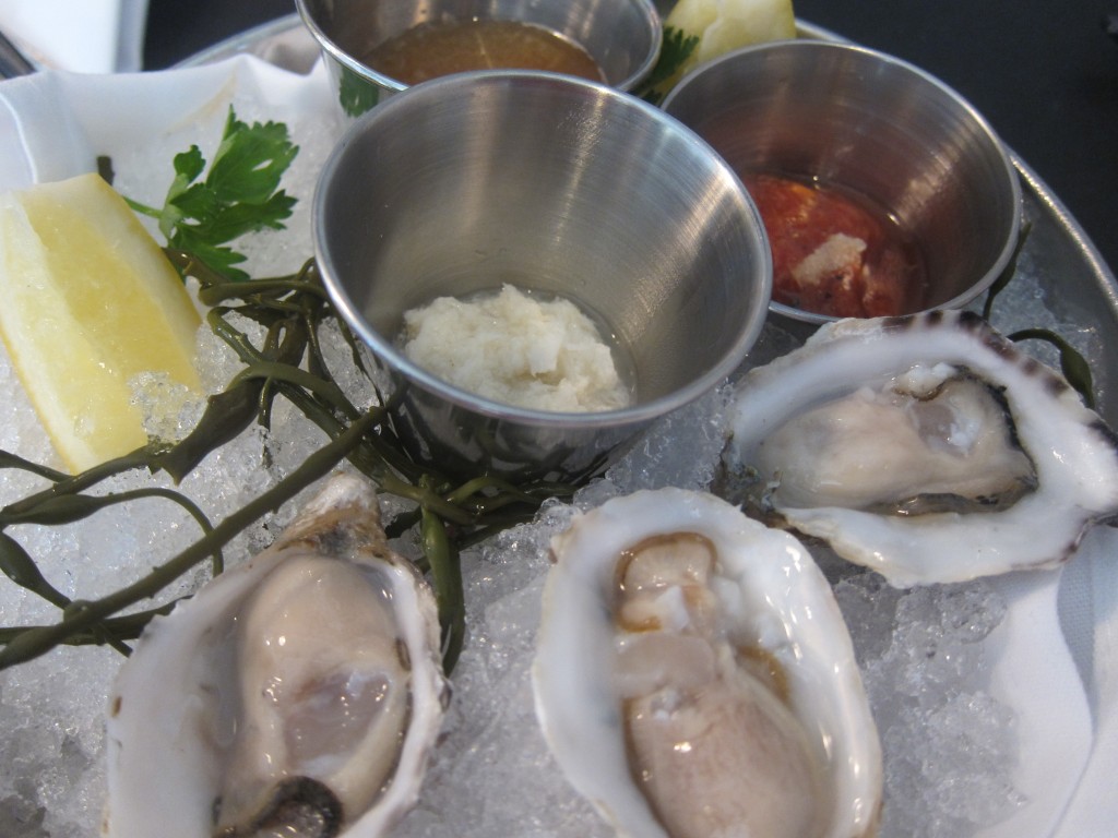 Oysters on the Half Shell with Horseradish, Lemon, Cocktail Sauce and Ponzu Sauce