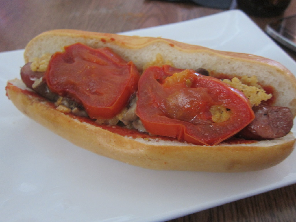 The Original Dog with roasted tomato, crispy parmesan and caramelized onions