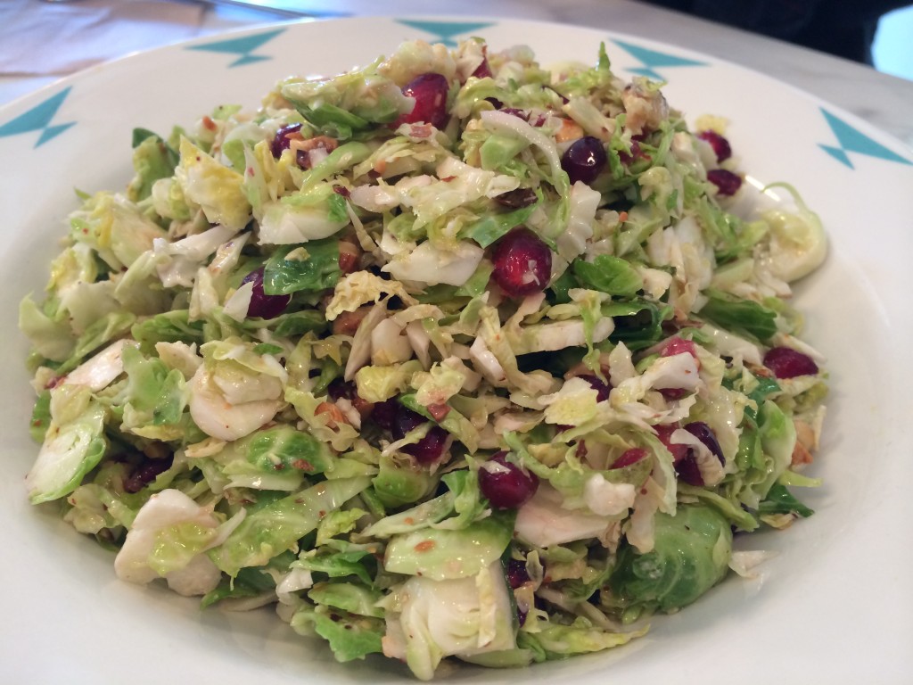 Shaved Brussels Sprout Salad with Pomegranate, Hazelnut and Lime Vinaigrette