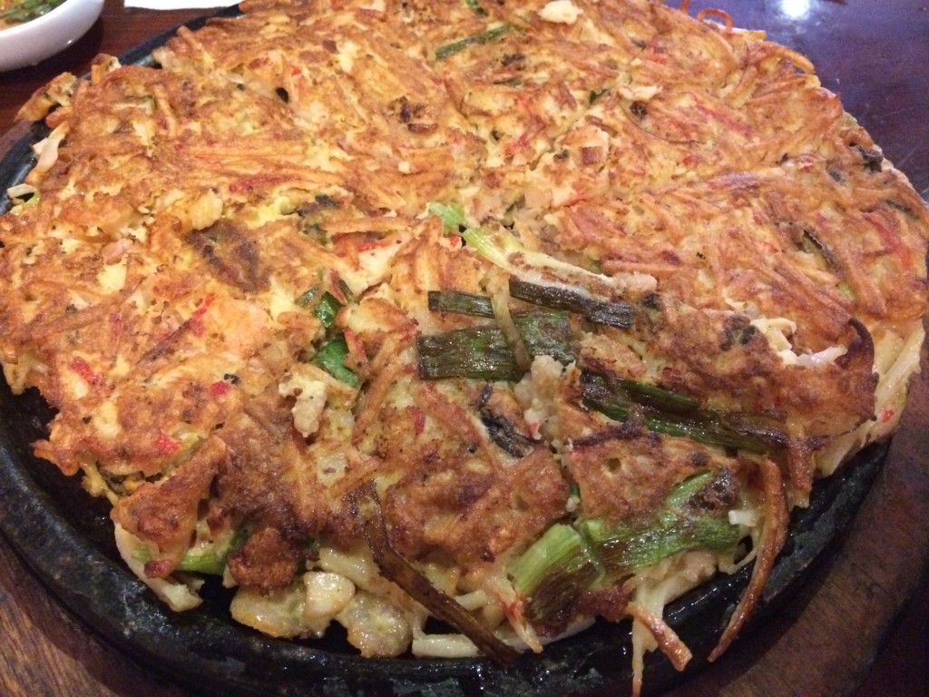 Haemul Pajun (sizzling seafood pancake with scallops, shrimp, oyster, squid, clam and green onion)