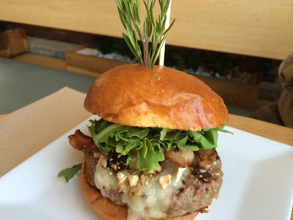 Piku "Fig" Burger from Pono Burger with Housemade Drunken Caramelized Fig Jam, Organic Beef Patty, Fermier Brie Cheese, Niman Ranch Bacon and Crushed Hazelnuts