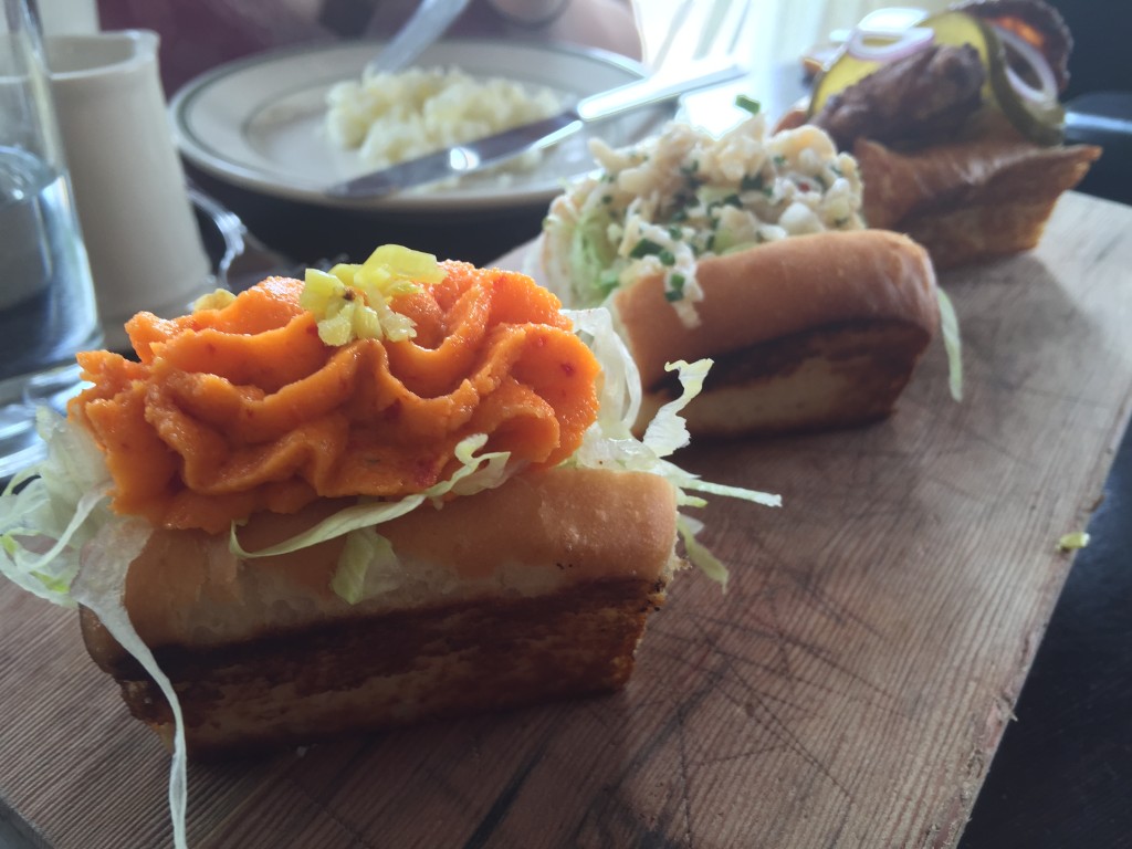 A Trio of Hot Buttered Buns (with Pimento Cheese, Dungeness Crab, and Hot Chicken) from The Woodsman Tavern