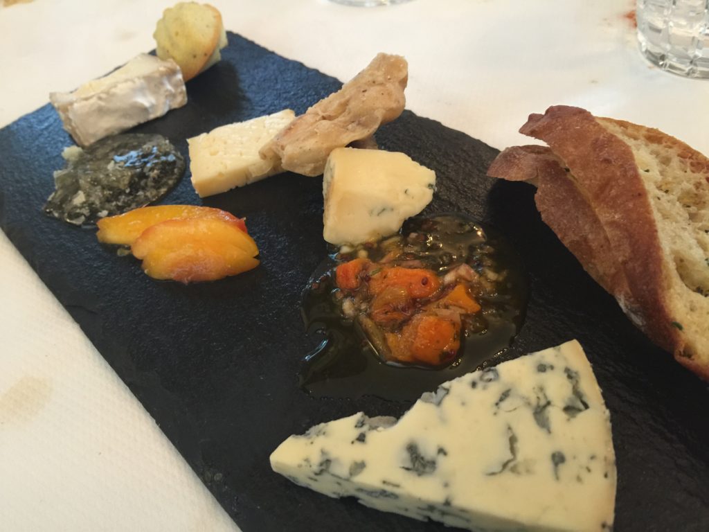 Finely Selected Cheeses with Apricot Mustardo, Pickled White Peach and Lemon-Poppyseed Madeleine